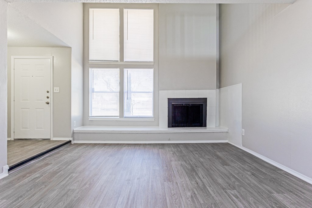 Living Room With Plenty Of Natural Light at Falls on Clearwood Apartments, Richardson, TX