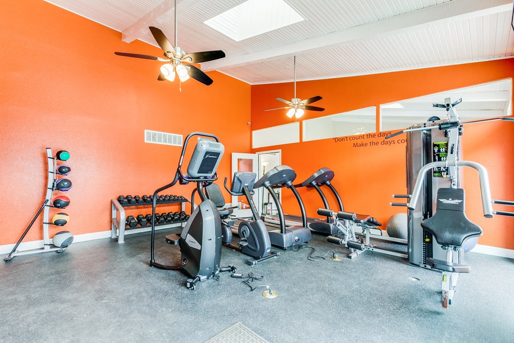 the gym has plenty of exercise equipment for your workouts at Falls on Clearwood Apartments, Richardson, TX, Texas
