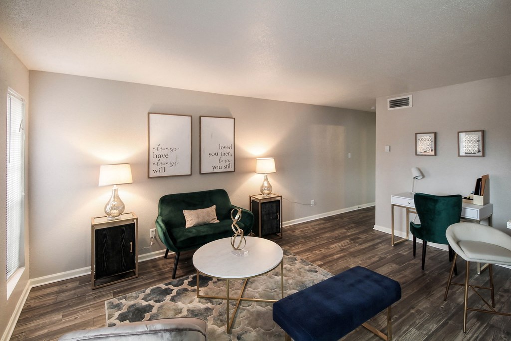 Carpeted living room at Seacrest Apartments, Garland, TX, 75044