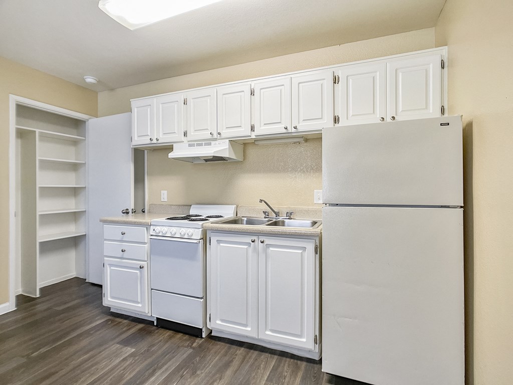 Kitchen with white cabinets at Valencia Park, Phoenix, AZ