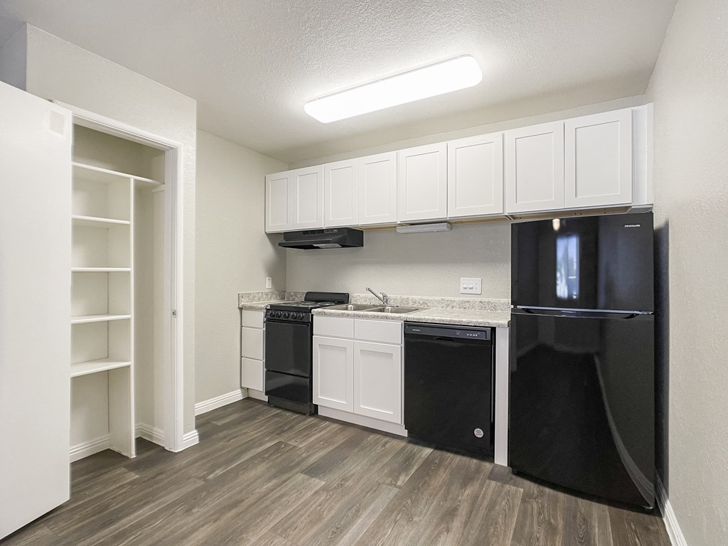 Empty Kitchen with Refrigerator at Valencia Park, Phoenix, Arizona