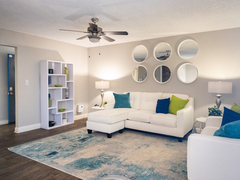 a living room with a white couch and a ceiling fan at Granite Bay, Phoenix, Arizona, 85023