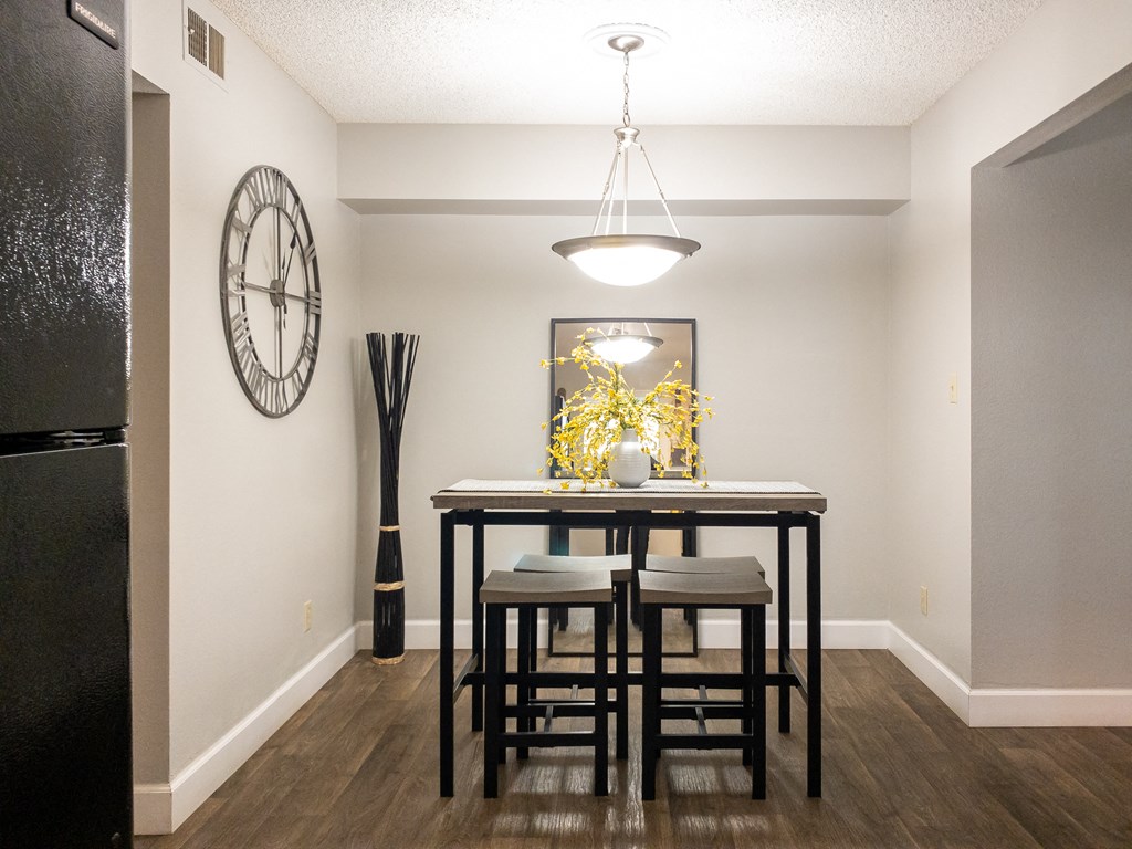 dinning room our apartments offer a dining room with a table and chairs at Granite Bay, Phoenix, Arizona, 85023