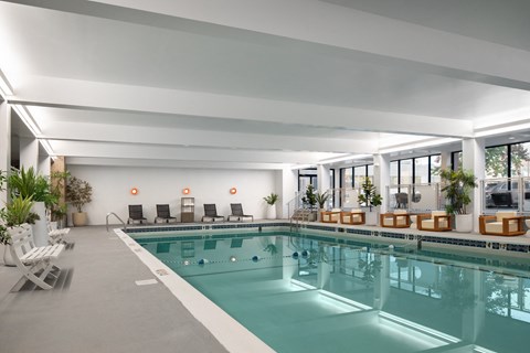 a swimming pool in the lobby of a hotel at Vision on Lombard, Baltimore, MD 21201