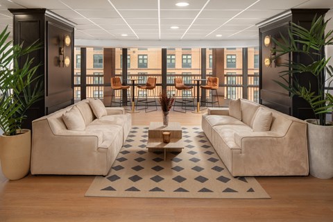 a living room with couches and a coffee table