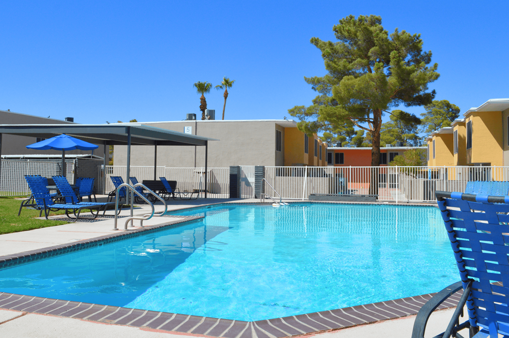 a swimming pool at a resort with chairs and umbrellas  Region2 at Summer Meadows, Nevada