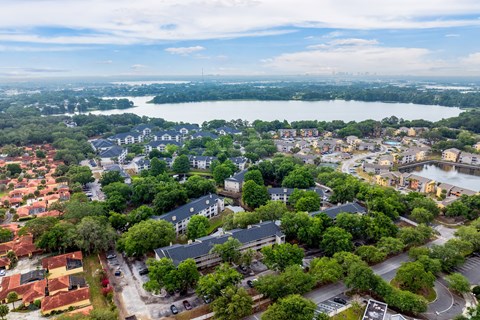 Aerial view of the neighborhood with a body of water at Village Lakes, Orlando, FL, 32808