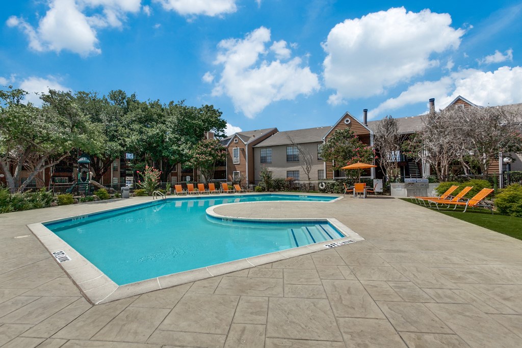the preserve at ballantyne commons pool and spa with apartment buildings