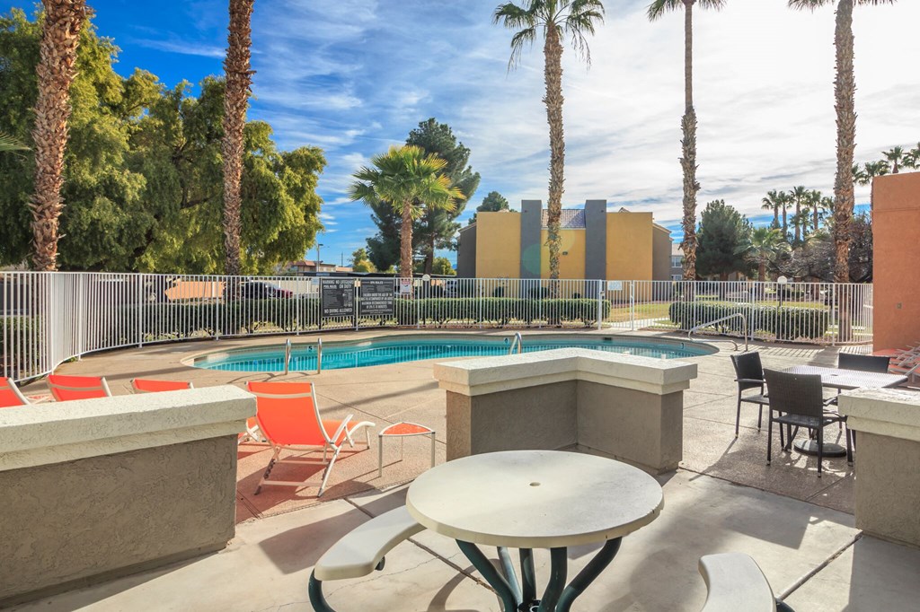 Swimming pool with relaxing area at Citrus Apartments, Las Vegas, Nevada
