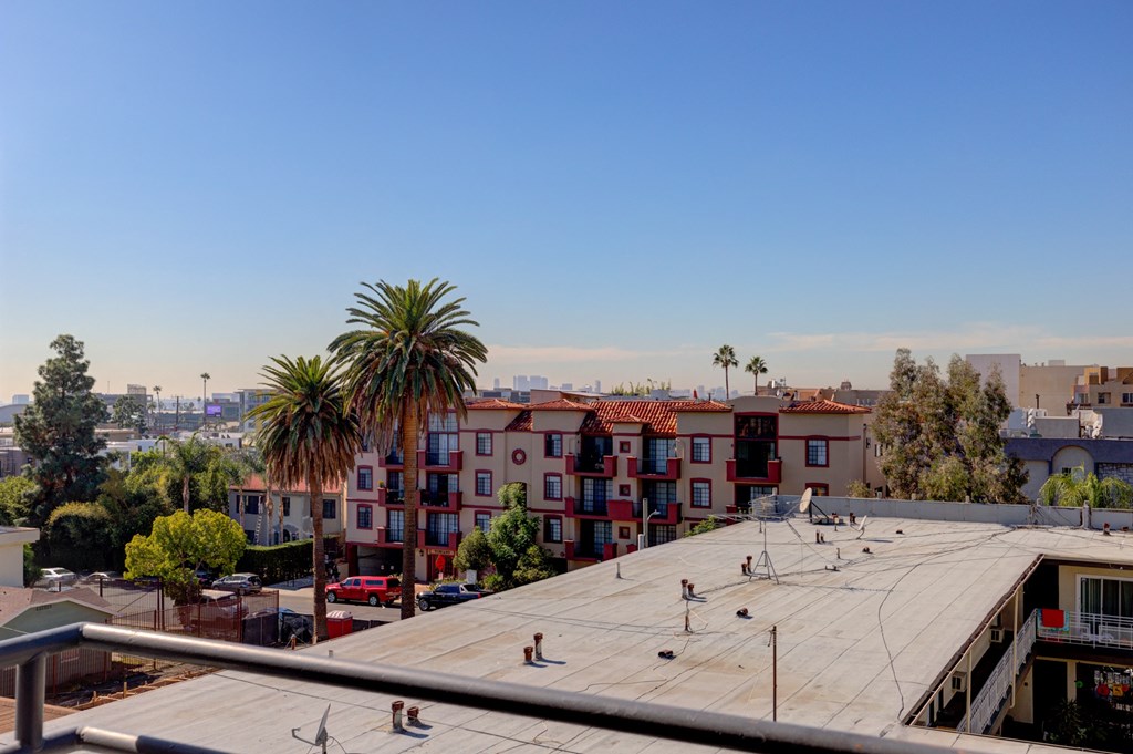 a view of the city from the roof of a building