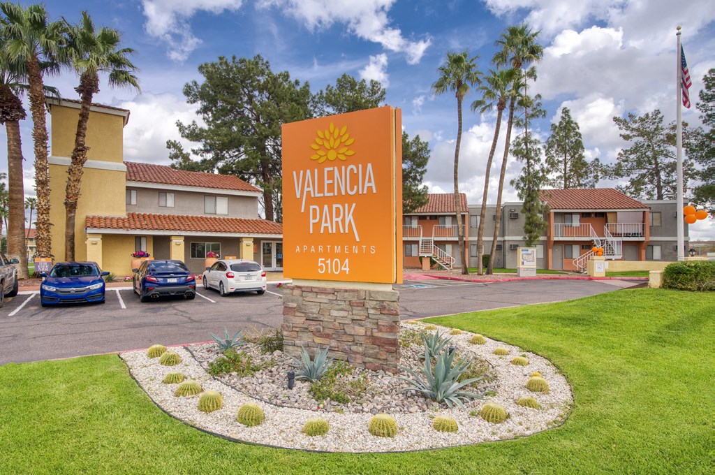 a parking lot with a sign that reads valencia park apartments at Valencia Park, Phoenix, AZ, 85008