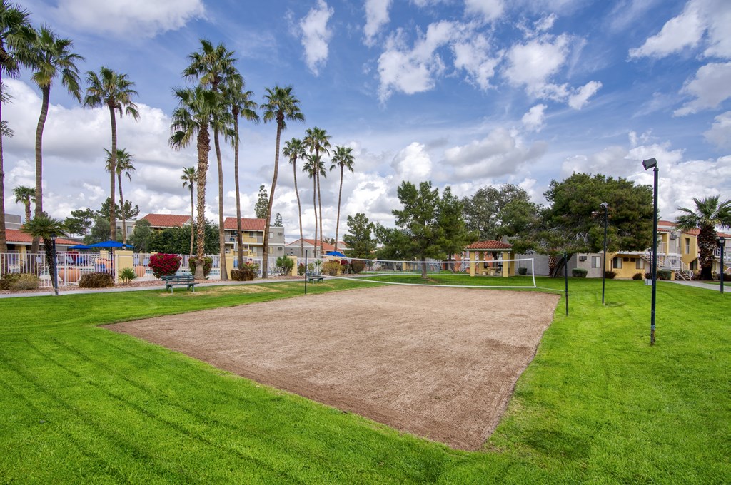 a baseball diamond with palm trees in the background at Valencia Park, Phoenix, Arizona