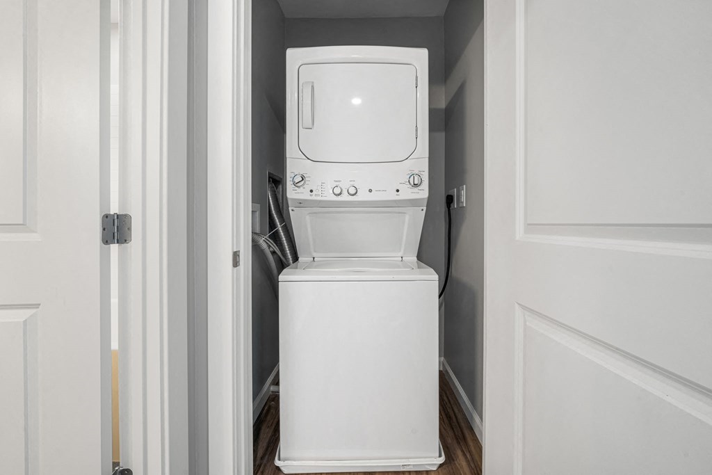 the laundry room has a washer and dryer in it