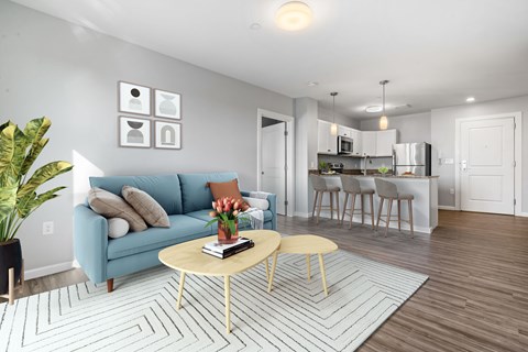 a living room with a couch and a table