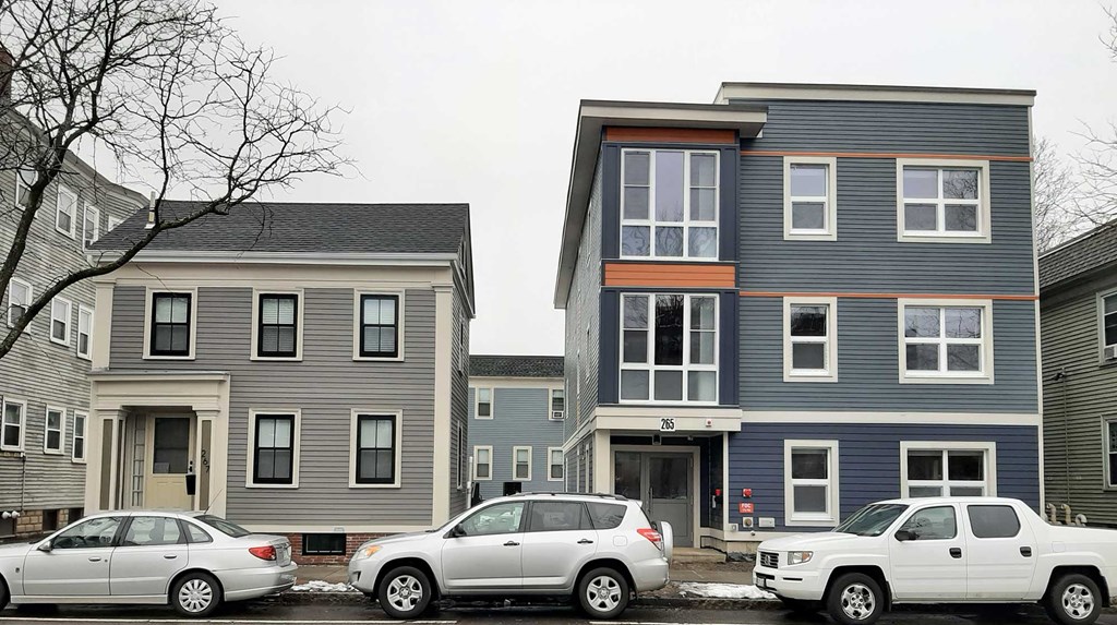 Squirrelwood - Photo Modern, elegant buildings match the character of the residential neighborhood