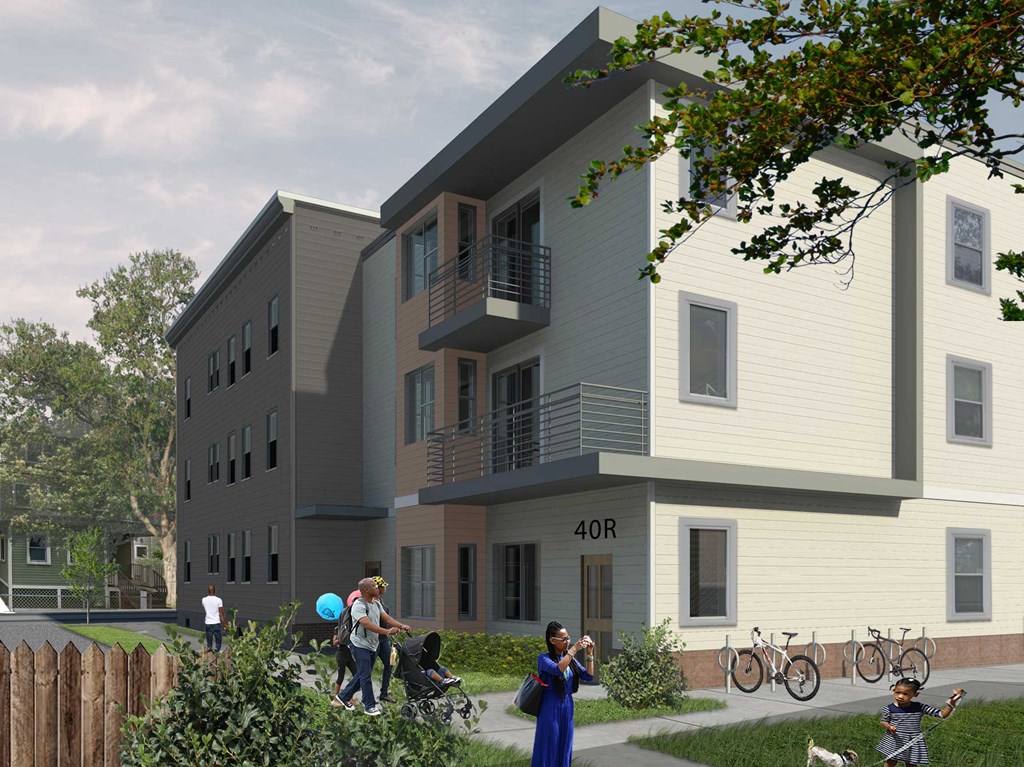 Squirrelwood Apartments - Rendering Beautiful greenspace behind a 3 story building with balconies