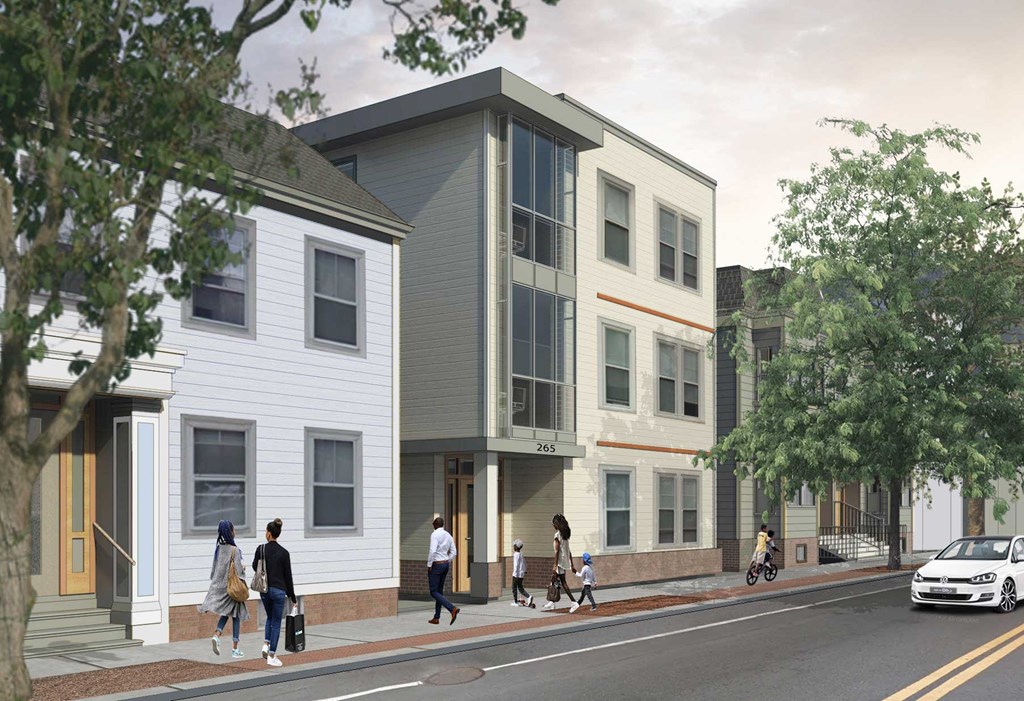 Modern 3 story building nestled into a quiet residential neighborhood