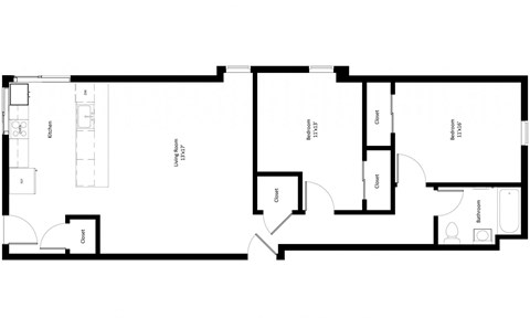 Open kitchen and living space with beds and bath to one side.