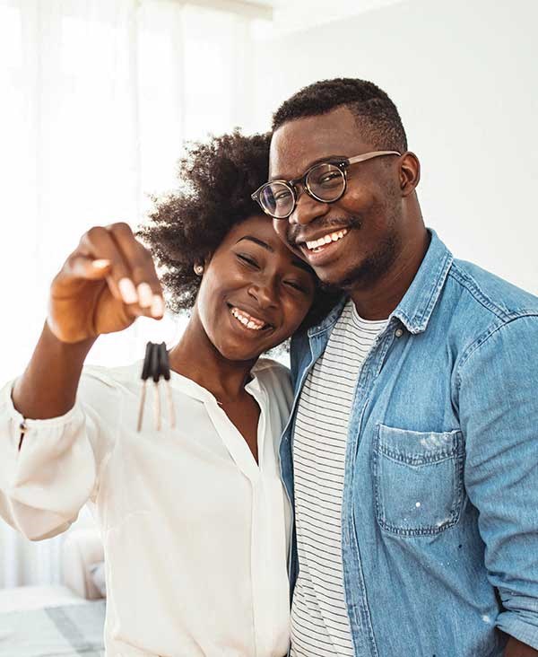 happy young couple moving in