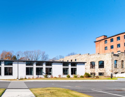 Community center with factory building behind