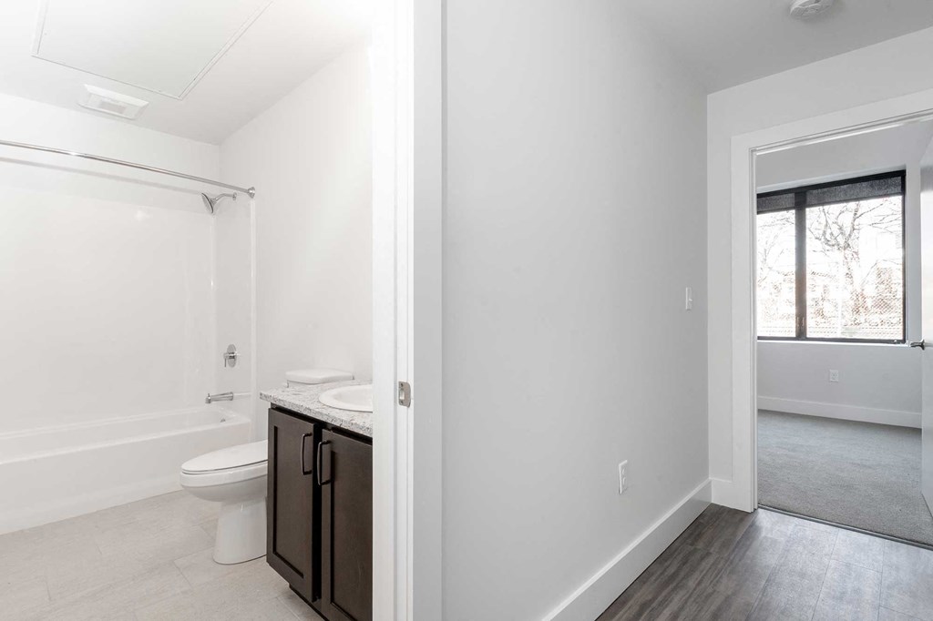 View of bathroom, hall and bedroom