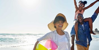 Family Family enjoying fun in the sun at the beach. - Photo Gallery 6
