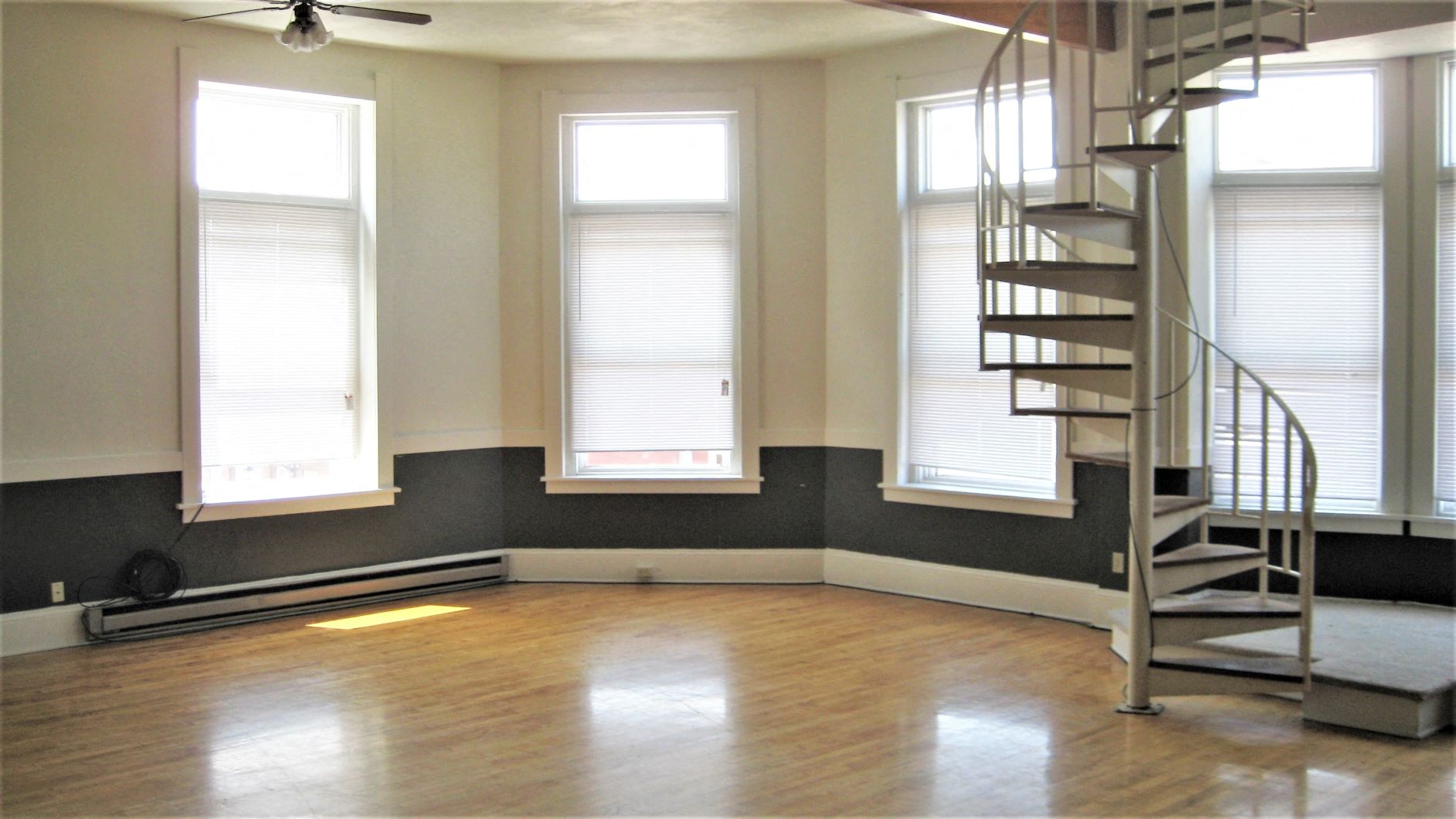 Apartment 301 | 1 BR | Living Area | Spiral Staircase | Three Sixty Real Estate