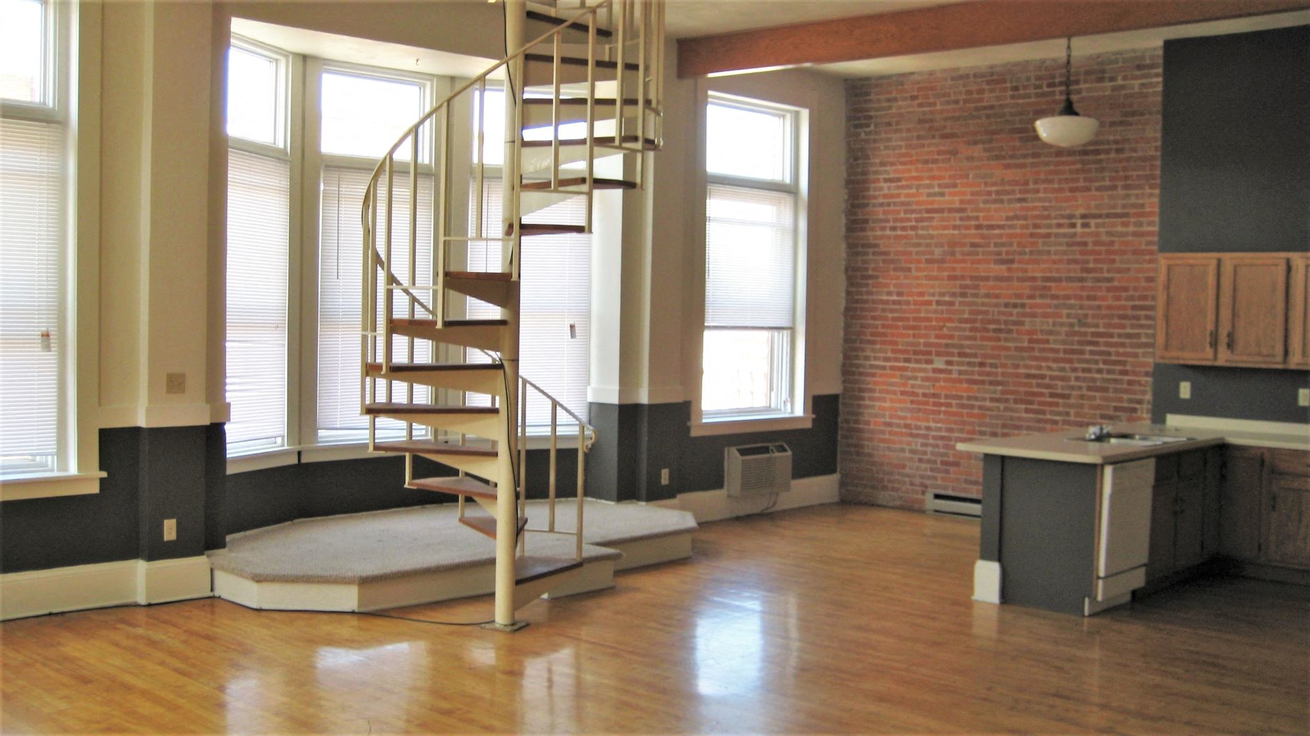 Apartment 301 | 1 BR | Living Area | Spiral Staircase | Three Sixty Real Estate