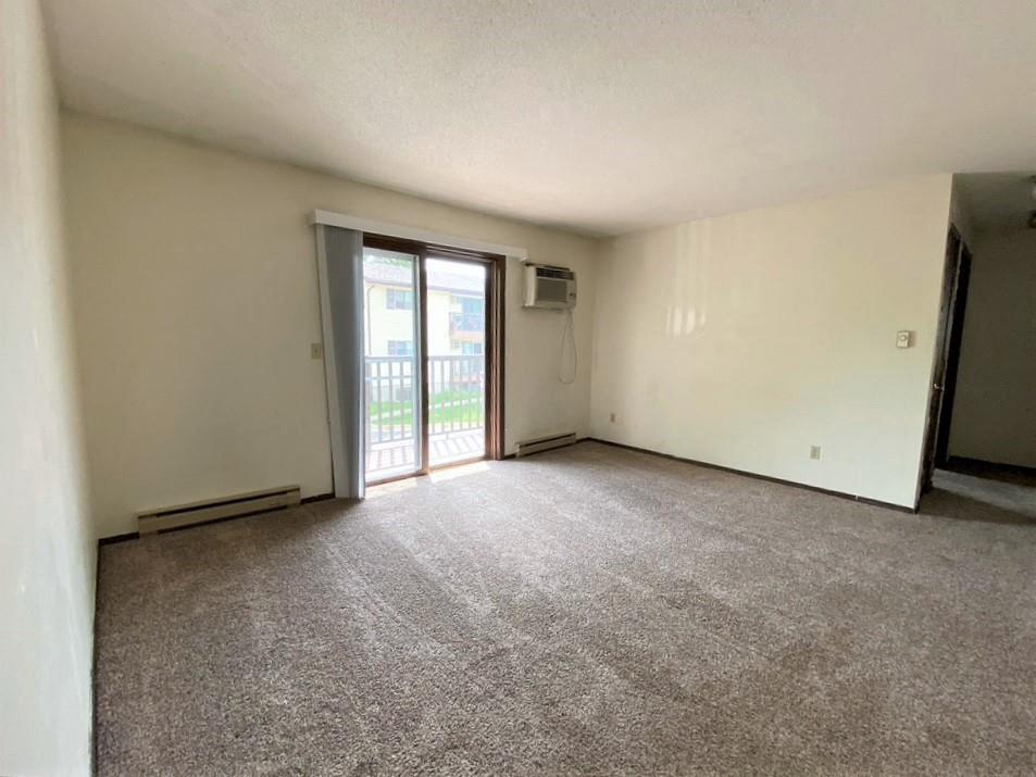 2 BR | Living Area | Carpet | Balcony | Three Sixty Real Estate