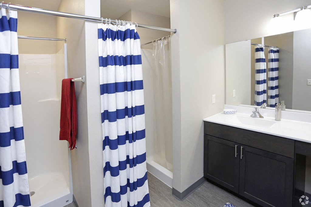 Aguilera | Double Vanity and Showers