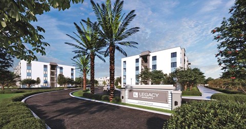A modern building with the name "LEGACY" on a sign in front of it.