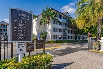 a building with a speed limit sign in front of it