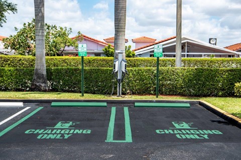 a charging only parking lot in front of a house