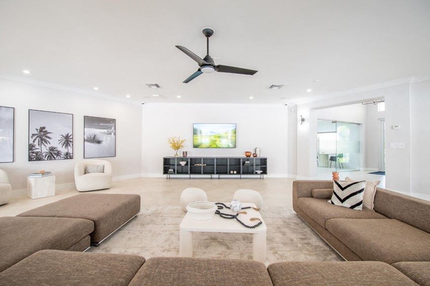 a living room with couches and a coffee table