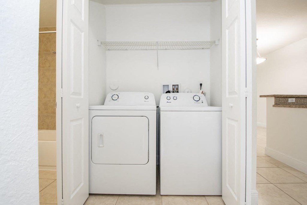 a washer and dryer in the laundry room of a home