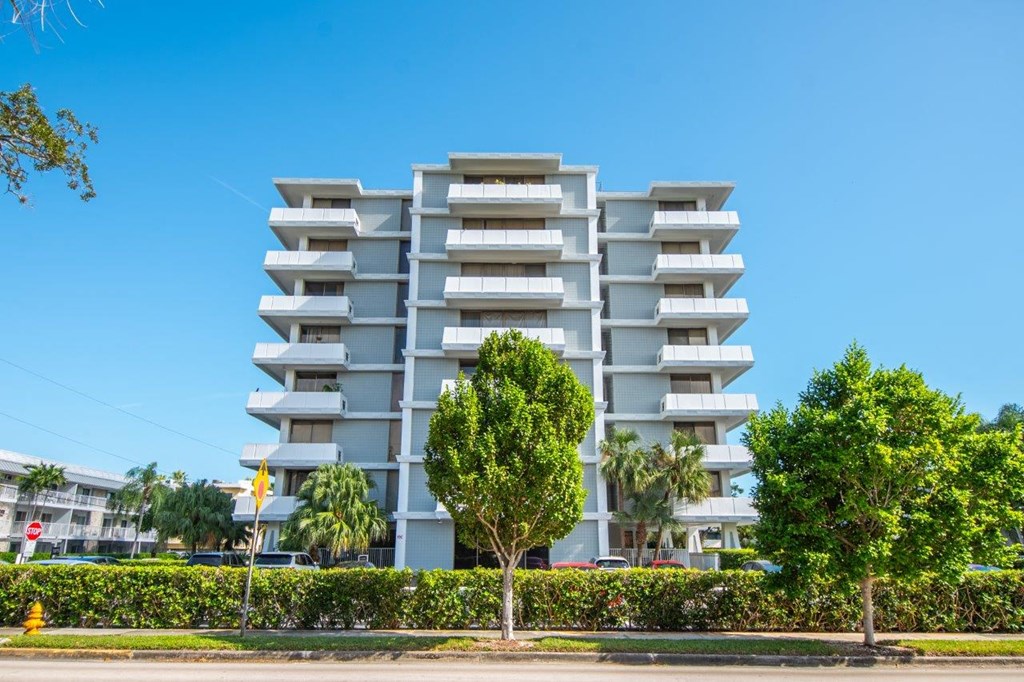 a view of an apartment building from the street