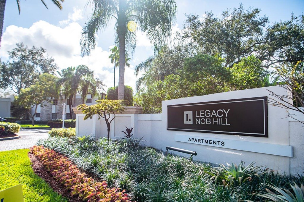 a monument sign is shown in front of a building