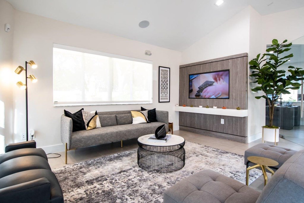 a living room with a couch and a table