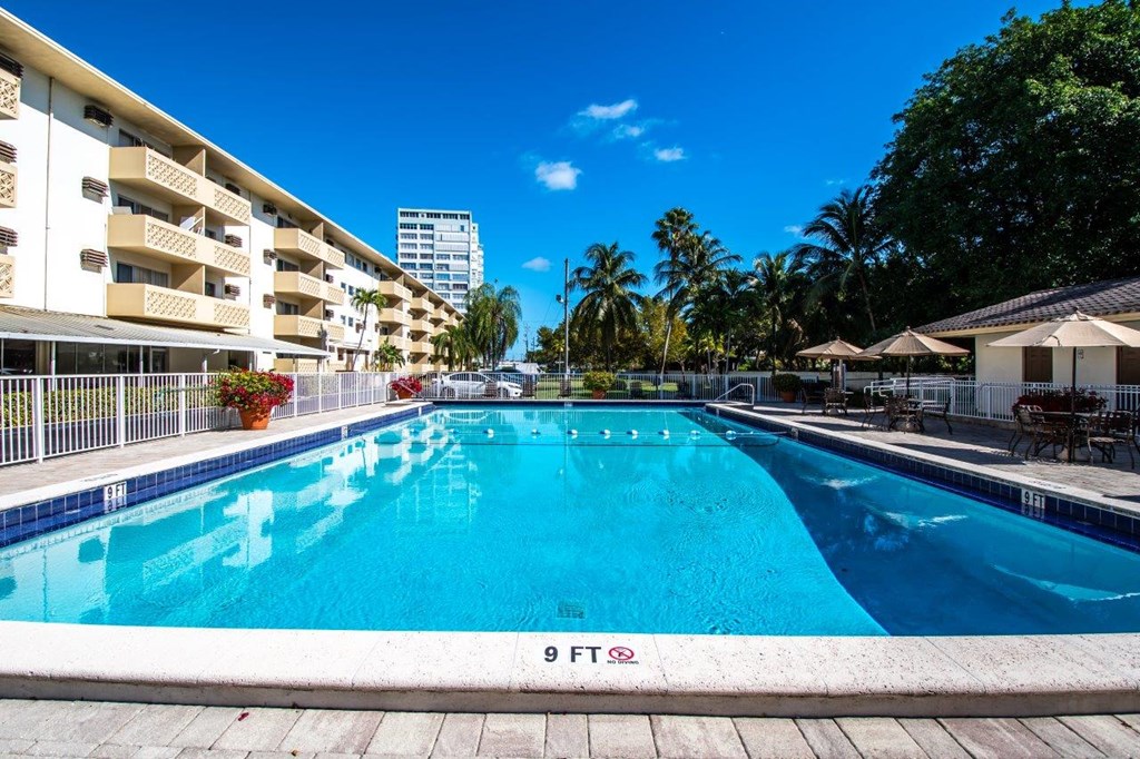 the swimming pool at or close to fitzgeralds hotel on the beach