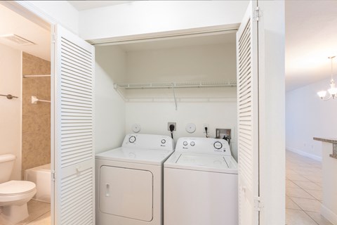 a washer and dryer in the laundry room of a home