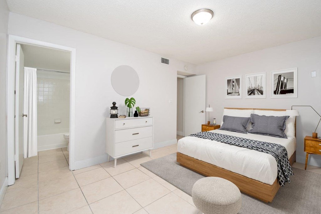 a bedroom with a bed and a closet