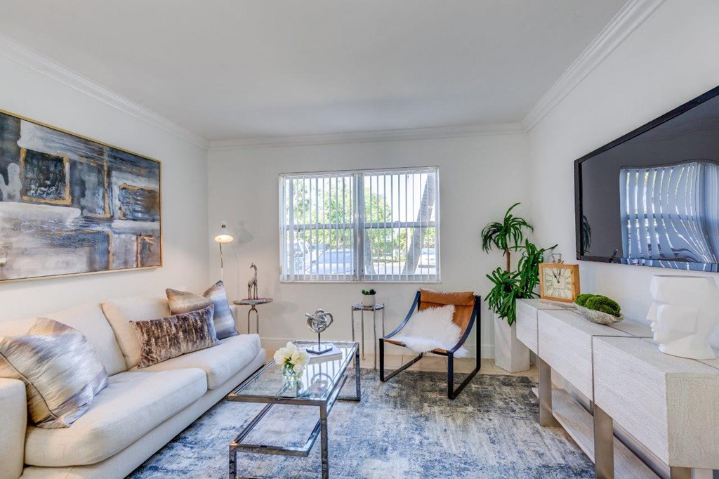a living room with a couch and a television