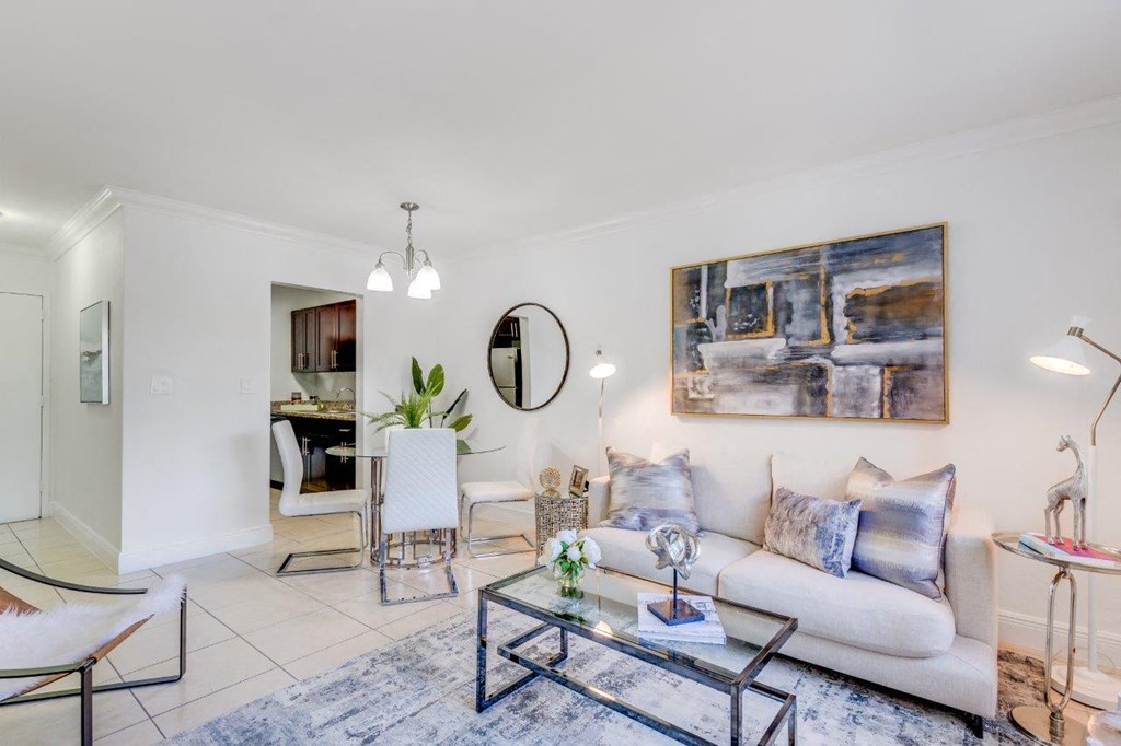 a living room with a couch and a table