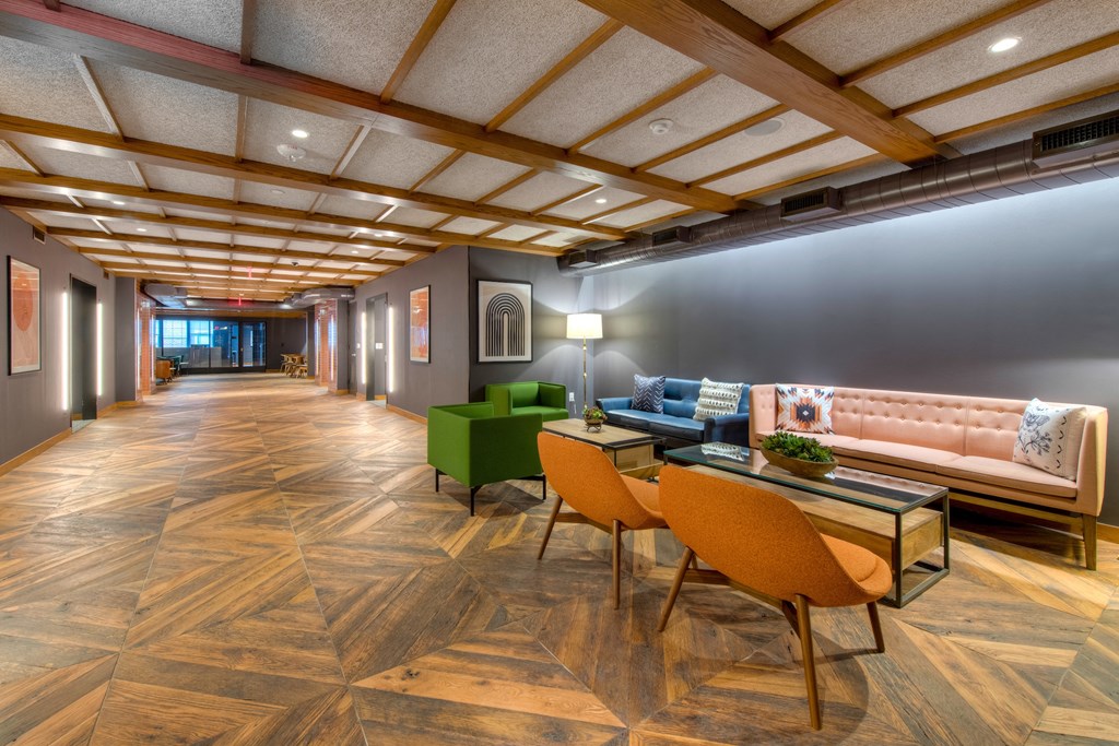 Lounge with couches, chairs, and a coffee table