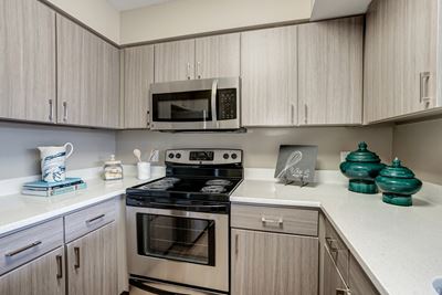 Kitchen with stove and microwave