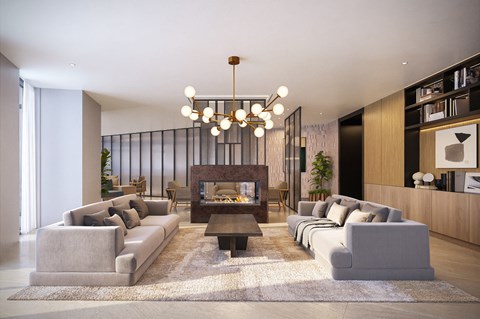 A modern living room with a fireplace and grey couches.