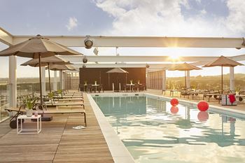 25-yard heated rooftop swimming pool offering panoramic views of the District