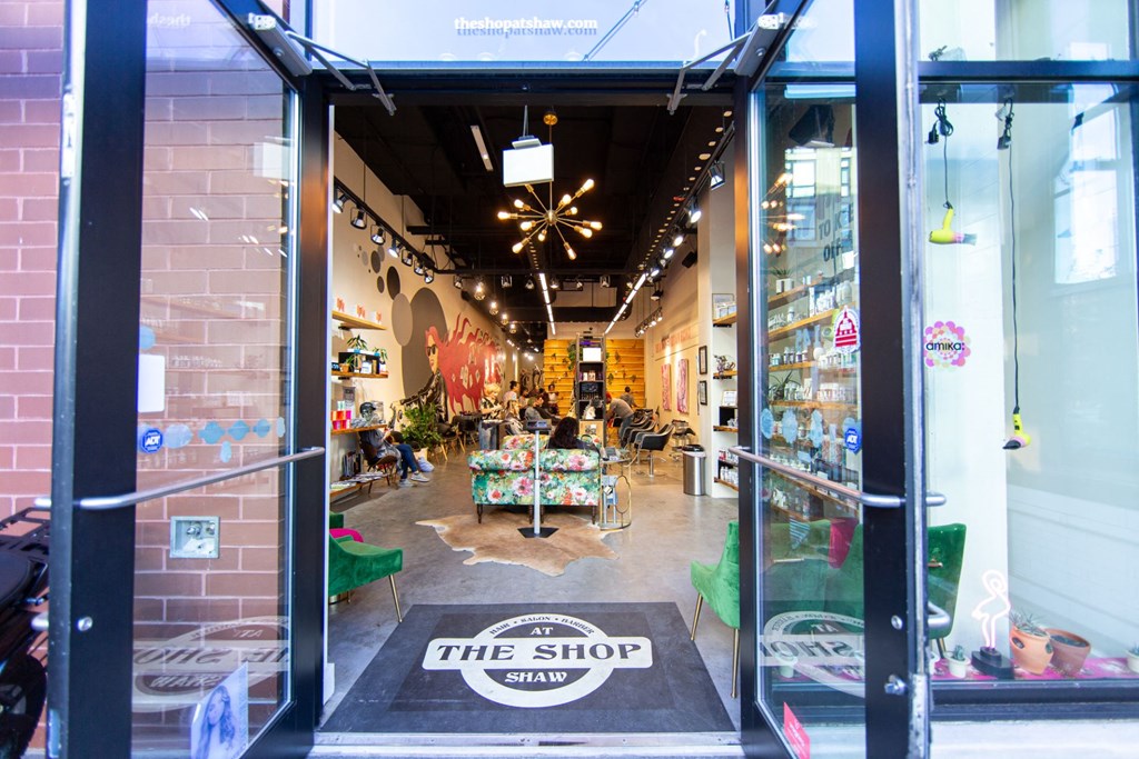 the shop front of the shop with doors open