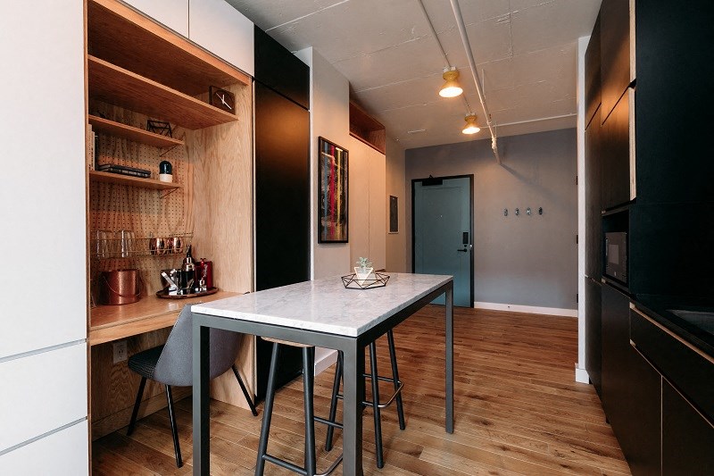 a kitchen and dining room in a small apartment