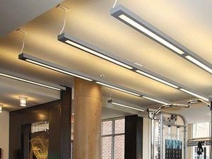 Fitness center with large windows, treadmills and workout benches